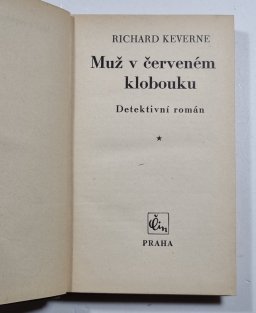 Muž v červeném klobouku